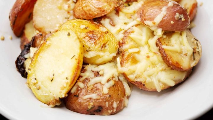 Cheesy Roasted Garlic Rosemary Potatoes