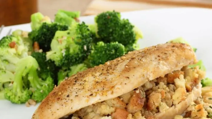 Apple Stuffed Chicken Breast {Baked Chicken Breast Recipe} Apple Stuffed Chicken Breast on white plate with broccoli