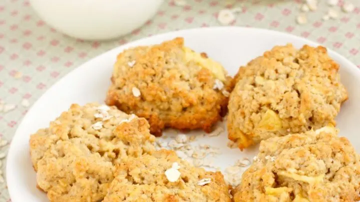 Apple Pie Cookies on white plate on a ref check tablecloth