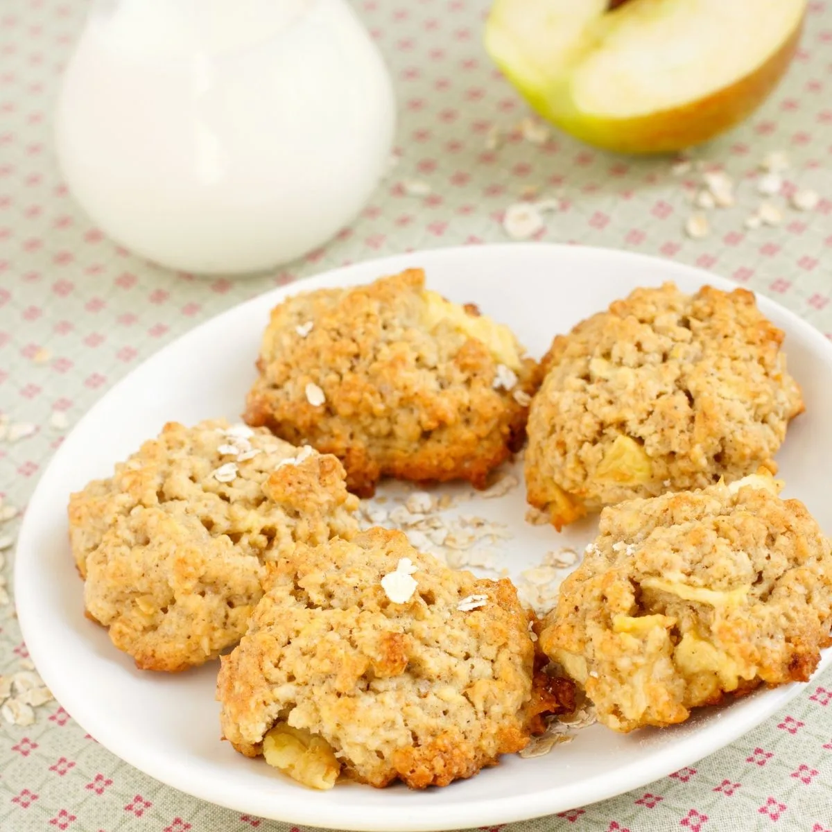 Apple Pie Cookies on white plate on a ref check tablecloth