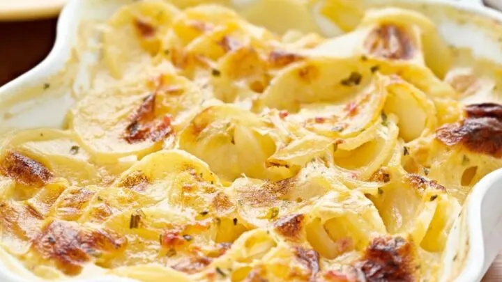 Buffalo Ranch Scalloped Potatoes {Simple Potato Side Dish} Potato side dishes I grew up in a mostly Irish house, so potato side dishes was always at dinner time. Besides mashed potatoes and fried potatoes we also would have scalloped potatoes with cheese for special occasions. Quick potato recipes I know everyone is busy. So there is a need for quick potato recipes. One small trick I learned with a scalloped potatoes is by using canned sliced potatoes can save you a lot of prep time in the kitchen. Scalloped potatoes with cheese Using canned sliced potatoes for scalloped potatoes with cheese or only cuts down on slicing a potato, but the potatoes are already soft and can really soak up that cheesy sauce. In my family we love a very cheesy scalloped potatoes with cheese! Ranch potatoes As much as I like cheesy potatoes, I also love ranch. So adding some ranch flavor to potatoes is one way to change up scalloped potatoes. How can I make ranch potatoes, but keep it more like scalloped potatoes? Buffalo Ranch sauce The answer to making ranch potatoes into scalloped potatoes was a bottle of buffalo ranch sauce! Adding in some of the buffalo ranch sauce to a scalloped potato cheese sauce was genius. The buffalo ranch really complimented the cheese sauce for the potatoes. It changed up normal scalloped potatoes with cheese into something amazing. in a white casserole dish